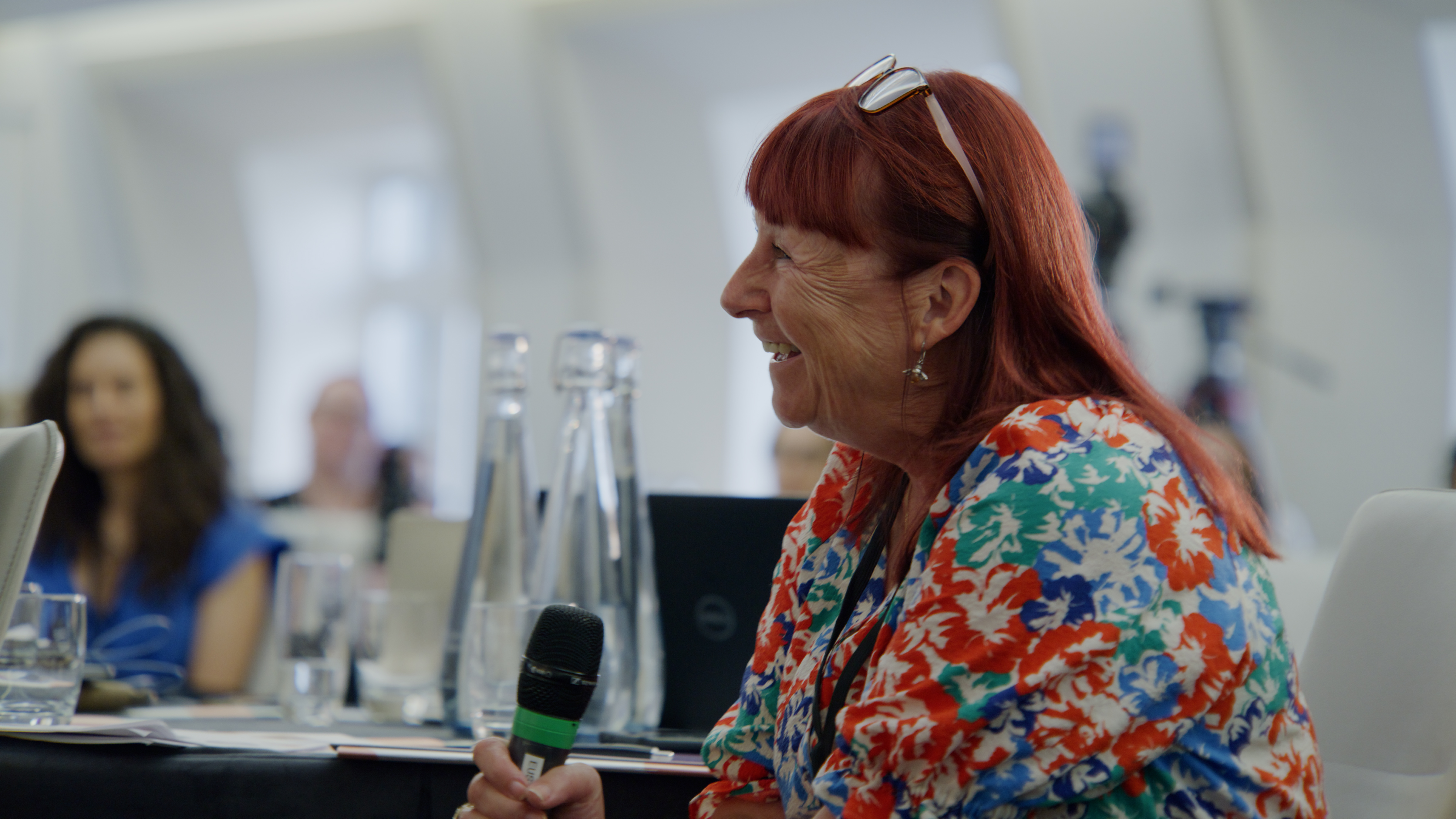 Attendee asking a question to the presenter